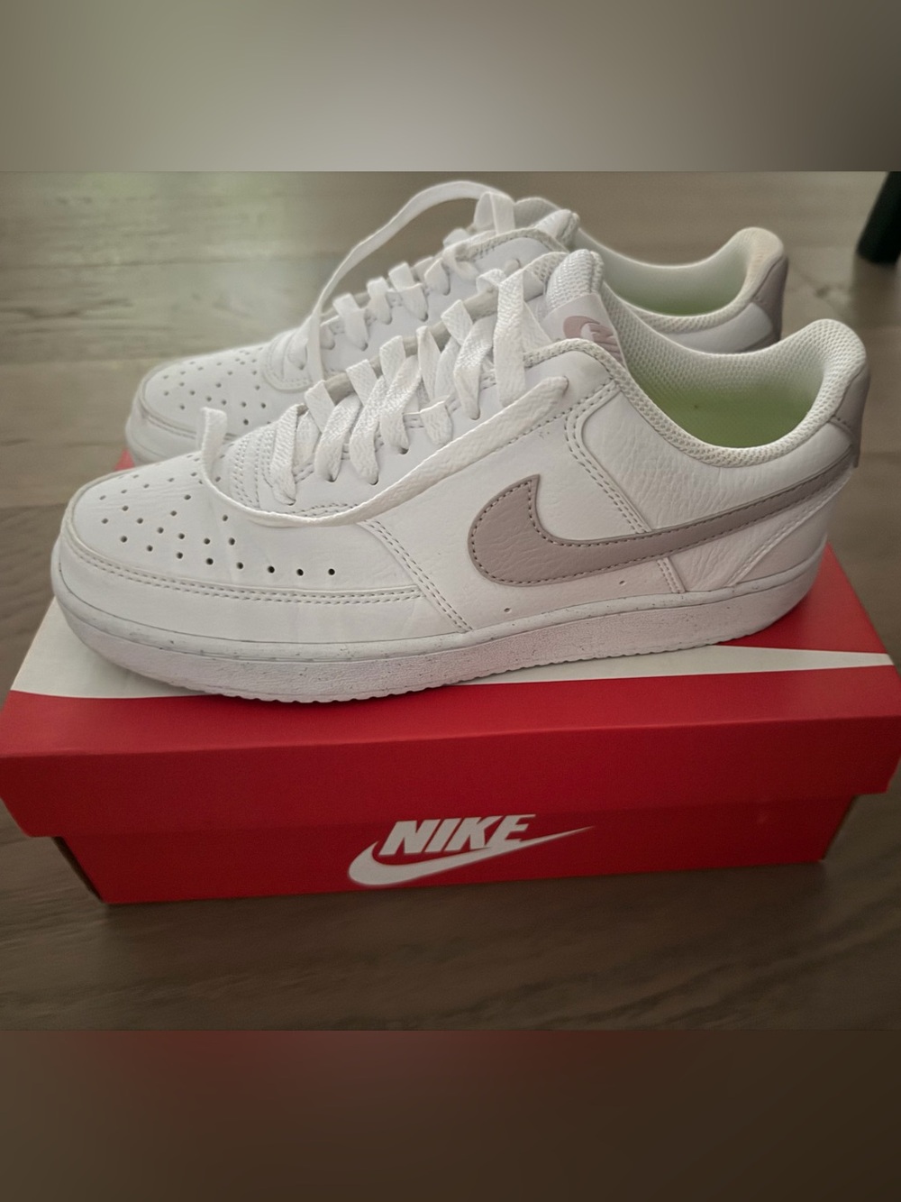 Nike White Sneakers with Light Pink Swoosh